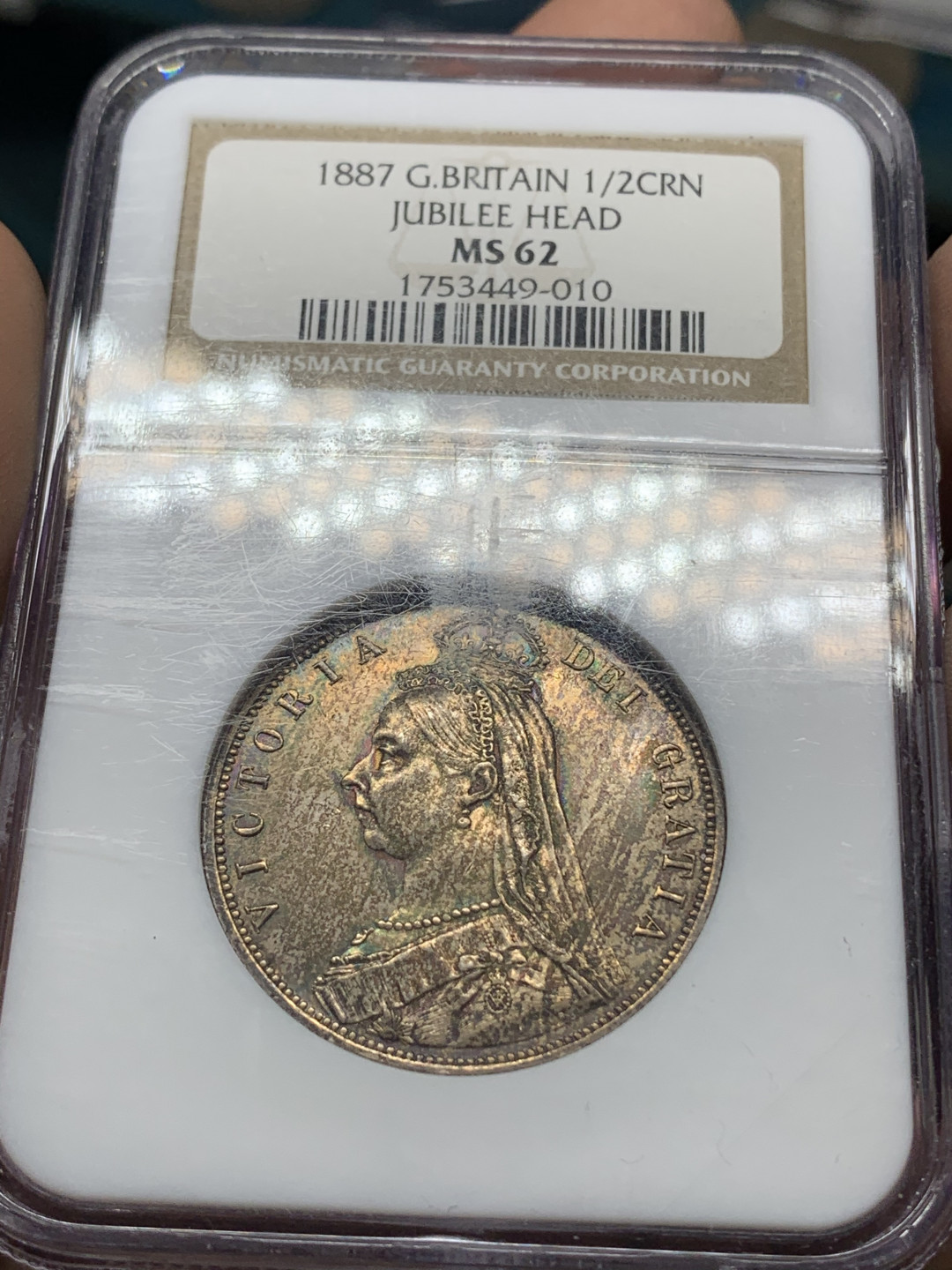 《竞宝斋》钱币微拍-第14场-本周日，周一2场连拍（全场顺丰包邮） NGC-MS62 英国 1887年 半克朗 重彩，对光正面淡金色背面五彩