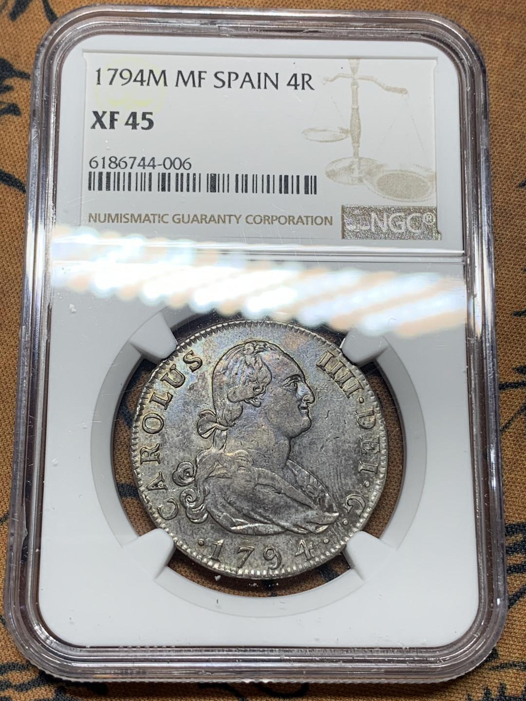 《竞宝斋》钱币微拍-第14场-本周日，周一2场连拍（全场顺丰包邮） 第三名 NGC-XF45 西班牙本土 1794年 卡洛斯四世 4R 半圆型老双柱 银币 好品带彩 比殖民地的稀少