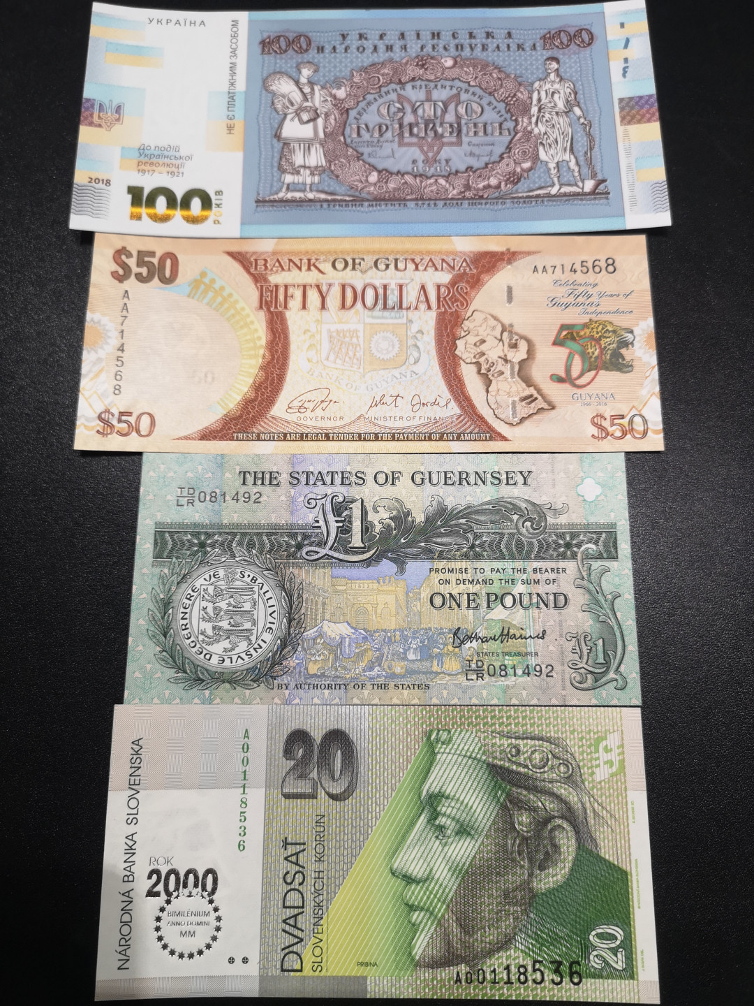 《外钞收藏家》第一百四十六期拍卖-超百件大拍场（本期106件） 乌克兰、圭亚那、格恩西、斯洛伐克 纪念钞4张 全新UNC