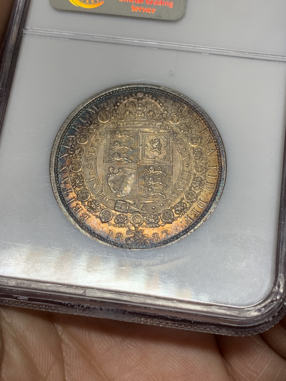 《竞宝斋》钱币微拍-第14场-本周日，周一2场连拍（全场顺丰包邮） NGC-MS62 英国 1887年 半克朗 重彩，对光正面淡金色背面五彩