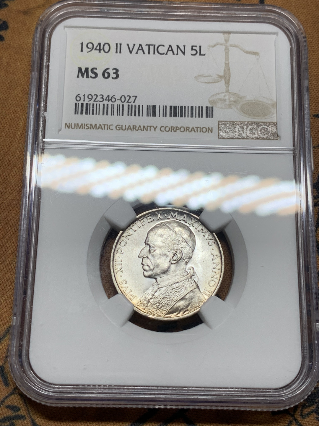 《竞宝斋》钱币微拍-第14场-本周日，周一2场连拍（全场顺丰包邮） NGC-MS63 梵蒂冈 1940年 教皇和小船 5里拉 银币 原光好品