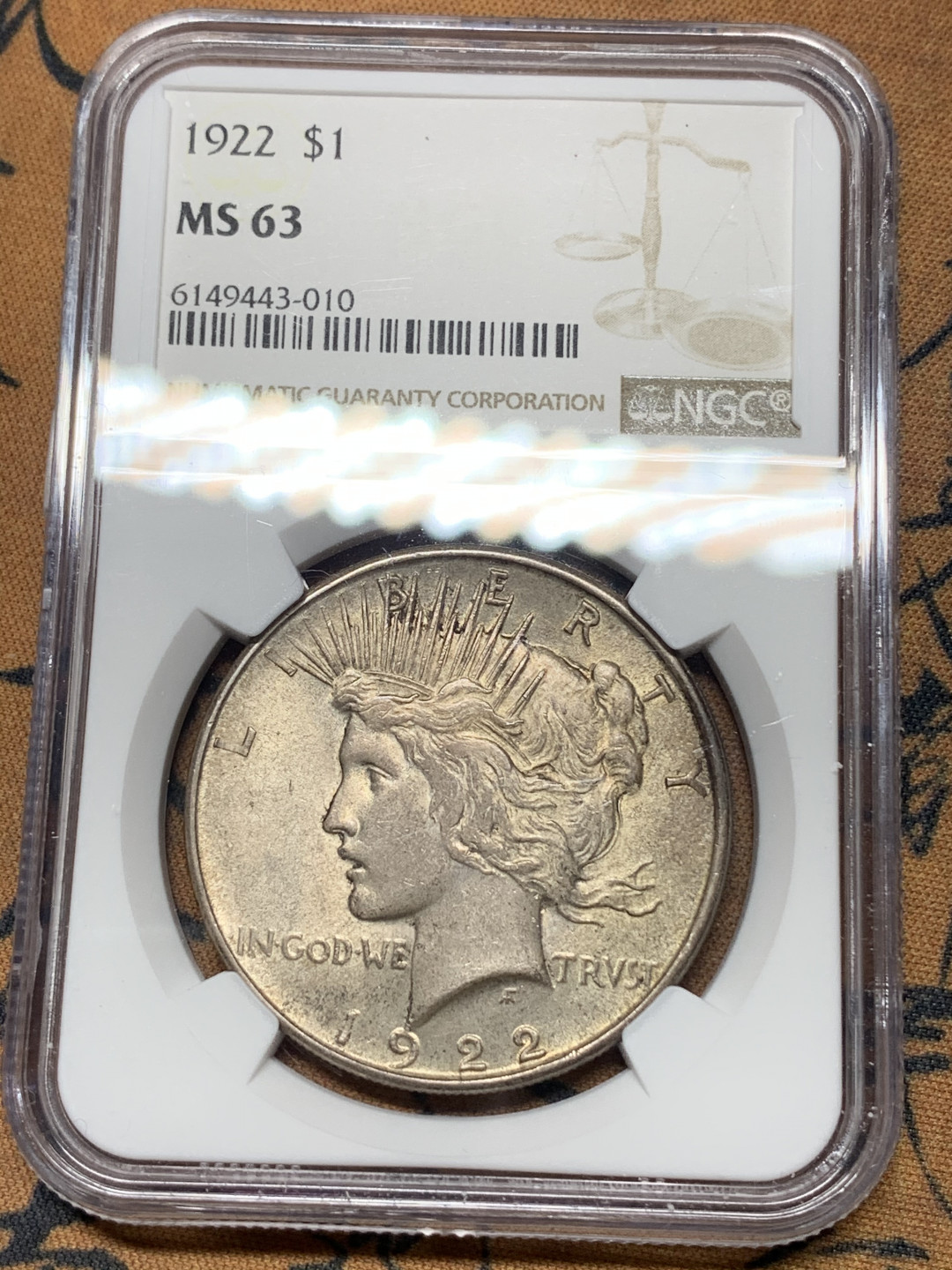 《竞宝斋》钱币微拍-第14场-本周日，周一2场连拍（全场顺丰包邮） NGC-MS63 美国 1922年 和平一元 转光银币