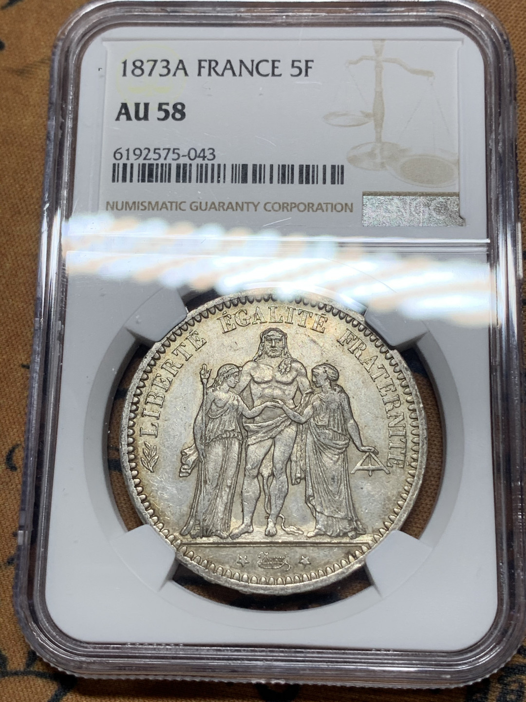 《竞宝斋》钱币微拍-第14场-本周日，周一2场连拍（全场顺丰包邮） NGC-AU58 法国 1873-A年 大力神 5法郎 银币 原味带光