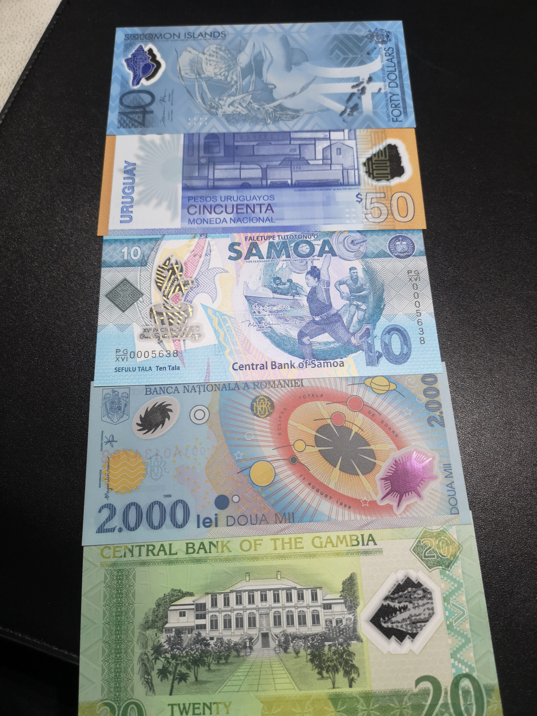 《外钞收藏家》第一百四十六期拍卖-超百件大拍场（本期106件） 所罗门、乌拉圭、萨摩亚、罗马尼亚、冈比亚 纪念钞5张 全新UNC