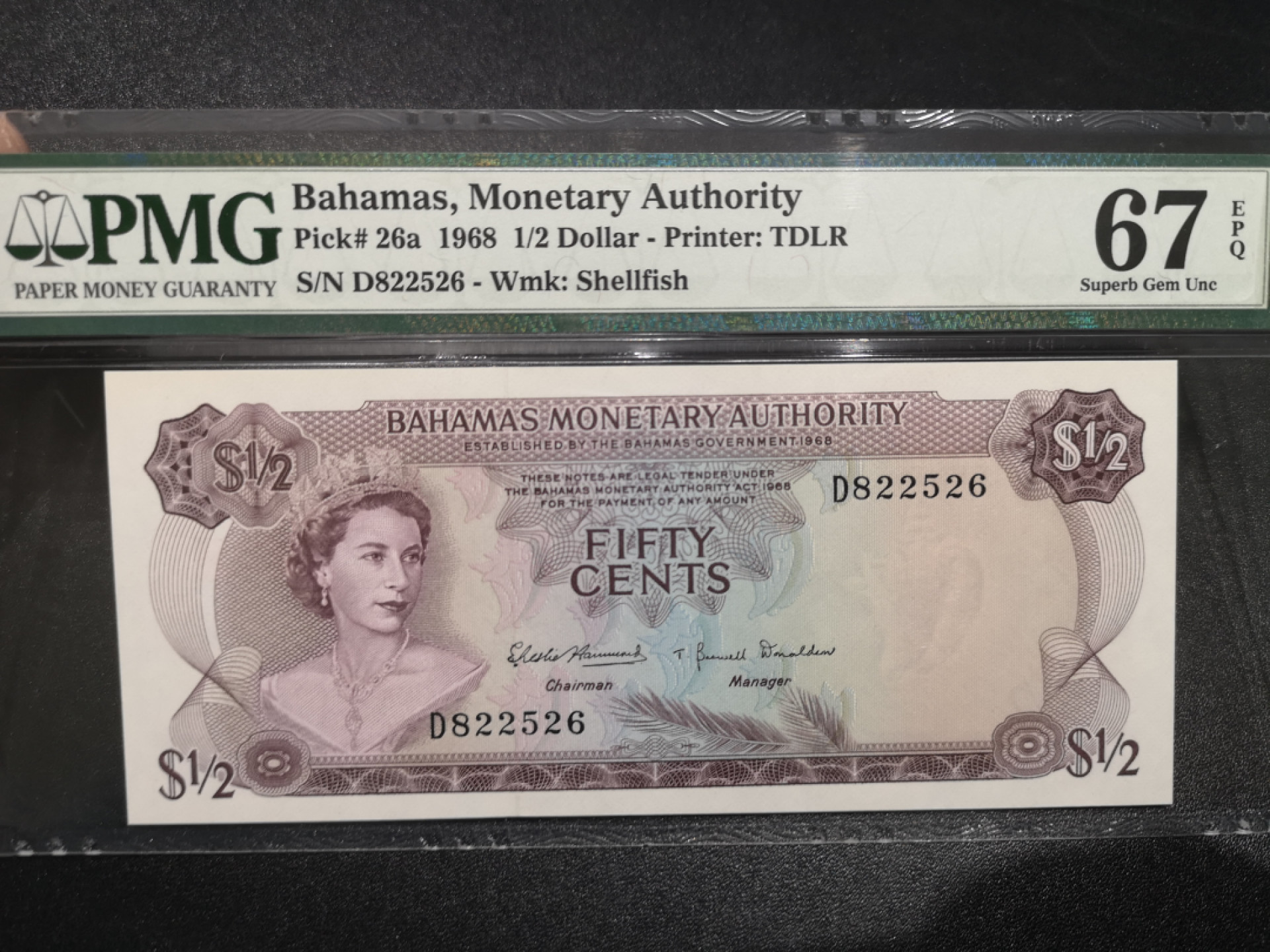 《外钞收藏家》第一百四十六期拍卖-超百件大拍场（本期106件） 1968年巴哈马1/2刀 PMG67 无47彩背