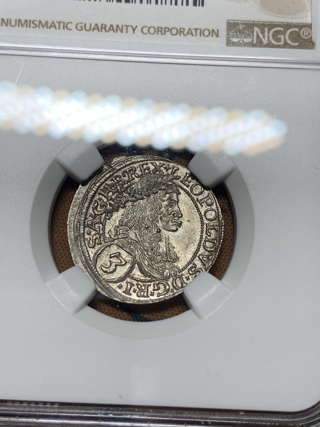 《竞宝斋》钱币微拍-第14场-本周日，周一2场连拍（全场顺丰包邮） 第三名 NGC-MS62 奥匈神罗 1673年 哈布斯堡利奥波德一世 3K 银币发丝细节清晰 原味带光 非常难得