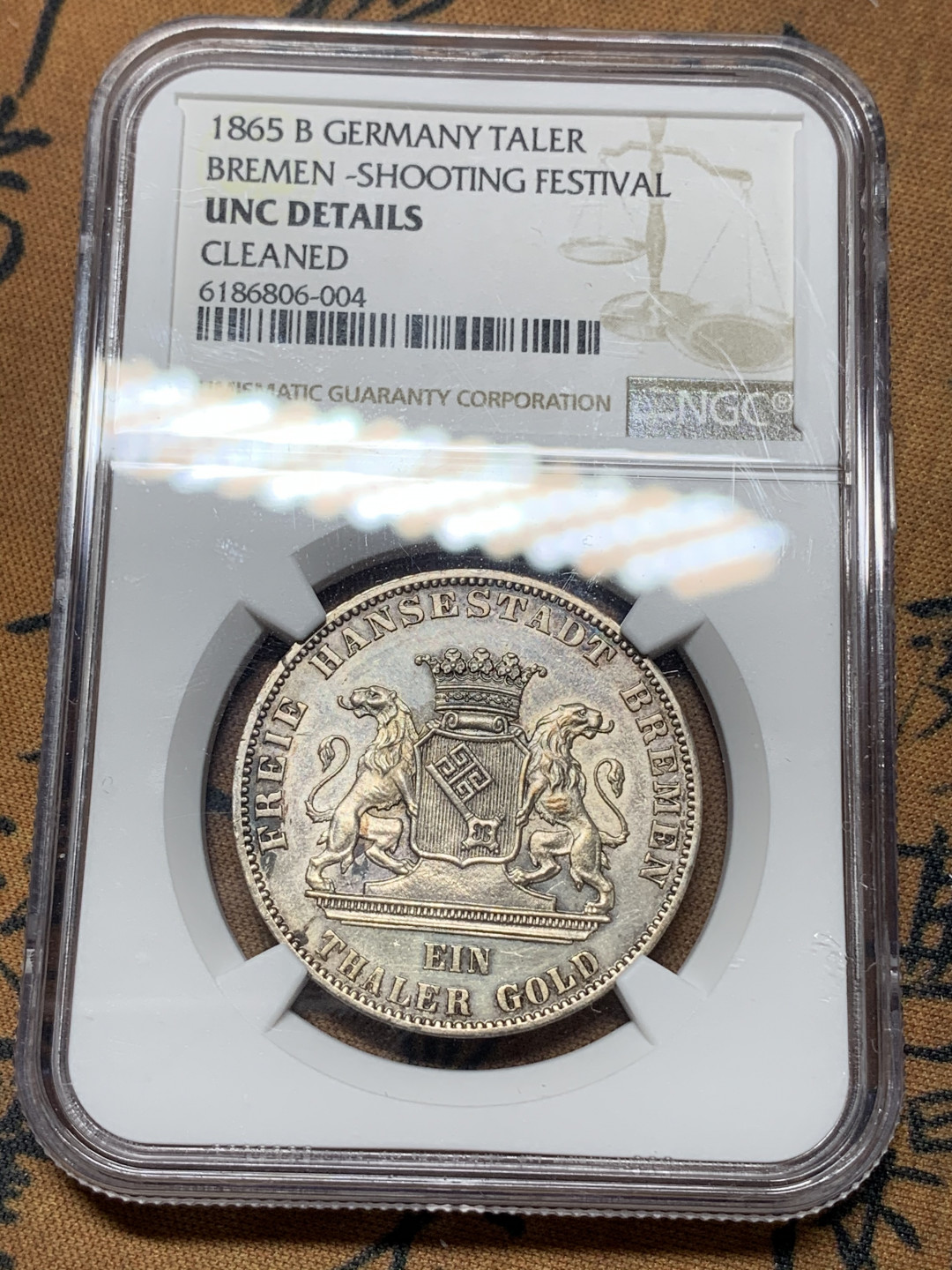 《竞宝斋》钱币微拍-第14场-本周日，周一2场连拍（全场顺丰包邮） NGC-UNC 德国1865年 不莱梅射击节1泰勒银币 有包浆 上分太难