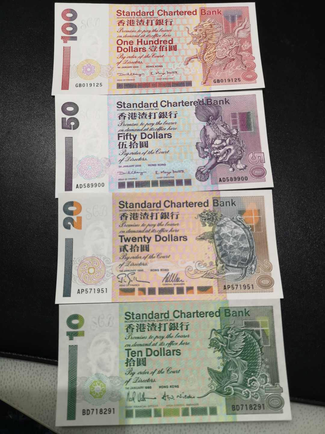 《外钞收藏家》第一百四十六期拍卖-超百件大拍场（本期106件） 香港渣打银行1993-2002序列小四枚全UNC