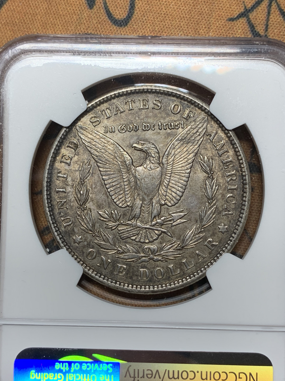 《竞宝斋》钱币微拍-第14场-本周日，周一2场连拍（全场顺丰包邮） NGC-AU58 美国 1900年 摩根1元 酱彩包浆银币 一流味道