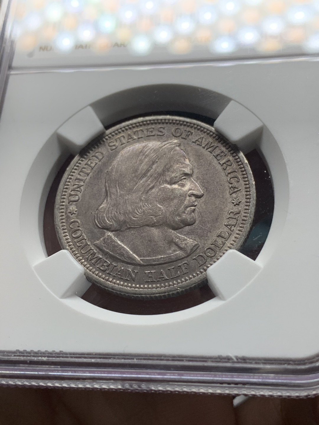 《竞宝斋》钱币微拍-第14场-本周日，周一2场连拍（全场顺丰包邮） NGC-AU55 美国 1892年 哥伦布半圆 银币 传世老包浆