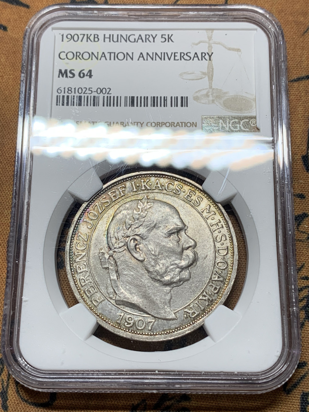 《竞宝斋》钱币微拍-第14场-本周日，周一2场连拍（全场顺丰包邮） NGC-MS64 原铸！匈牙利 1907年 加冕5克朗 银币 转光带彩包浆 一流的味道