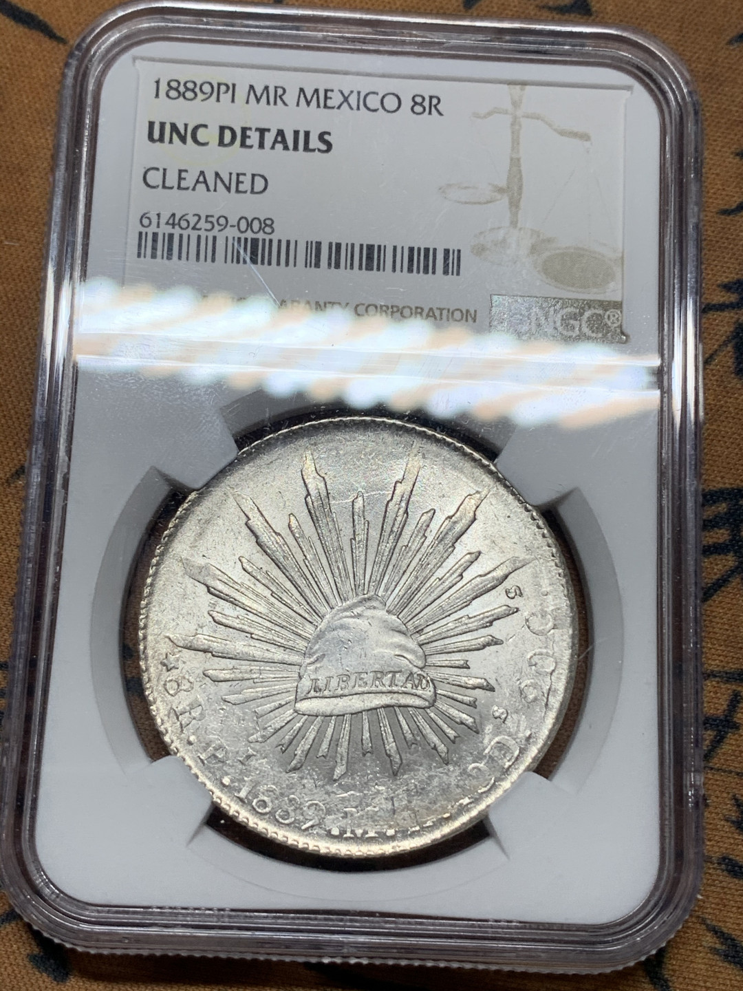 《竞宝斋》钱币微拍-第14场-本周日，周一2场连拍（全场顺丰包邮） NGC-UNCD 墨西哥 1889年 8 里亚尔 波多西厂 银币 原光PI厂中期老鹰 可以砸盒试试