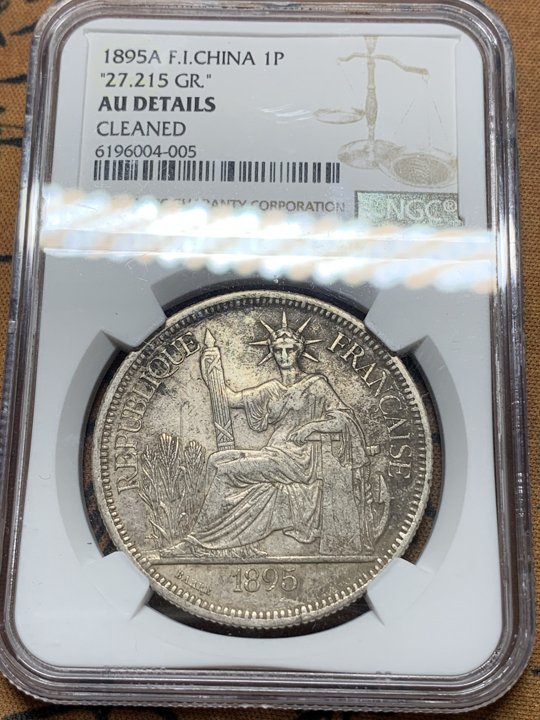 《竞宝斋》钱币微拍-第14场-本周日，周一2场连拍（全场顺丰包邮） NGC-AU CLEANED 1895年 加重 坐洋 鼻梁可见 