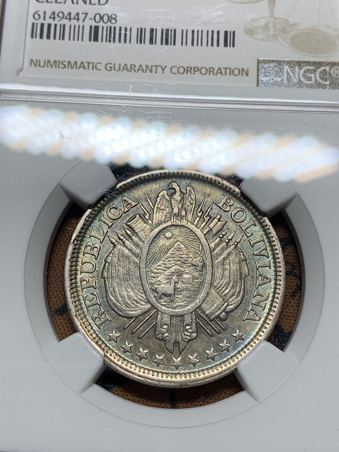 《竞宝斋》钱币微拍-第14场-本周日，周一2场连拍（全场顺丰包邮） NGC-AU 玻利维亚 1891年 无重版 50分 银币 带点蓝彩 很漂亮