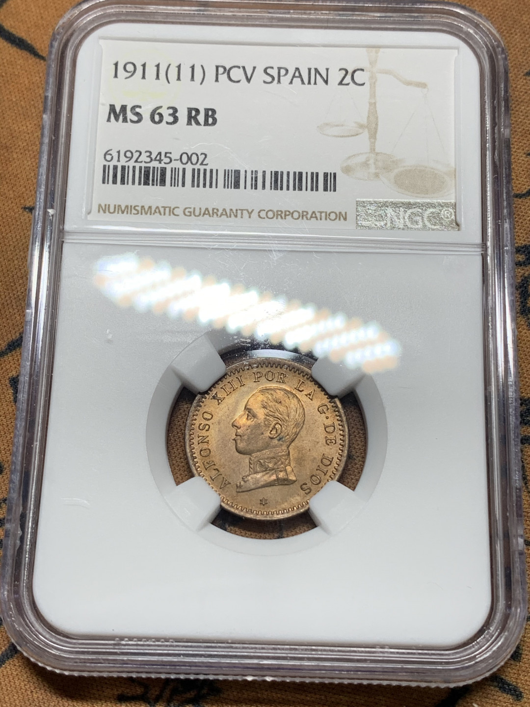 《竞宝斋》钱币微拍-第14场-本周日，周一2场连拍（全场顺丰包邮） NGC-MS63 西班牙 1911年 阿方索十三世 2分 铜币 较少见的品种好品难得