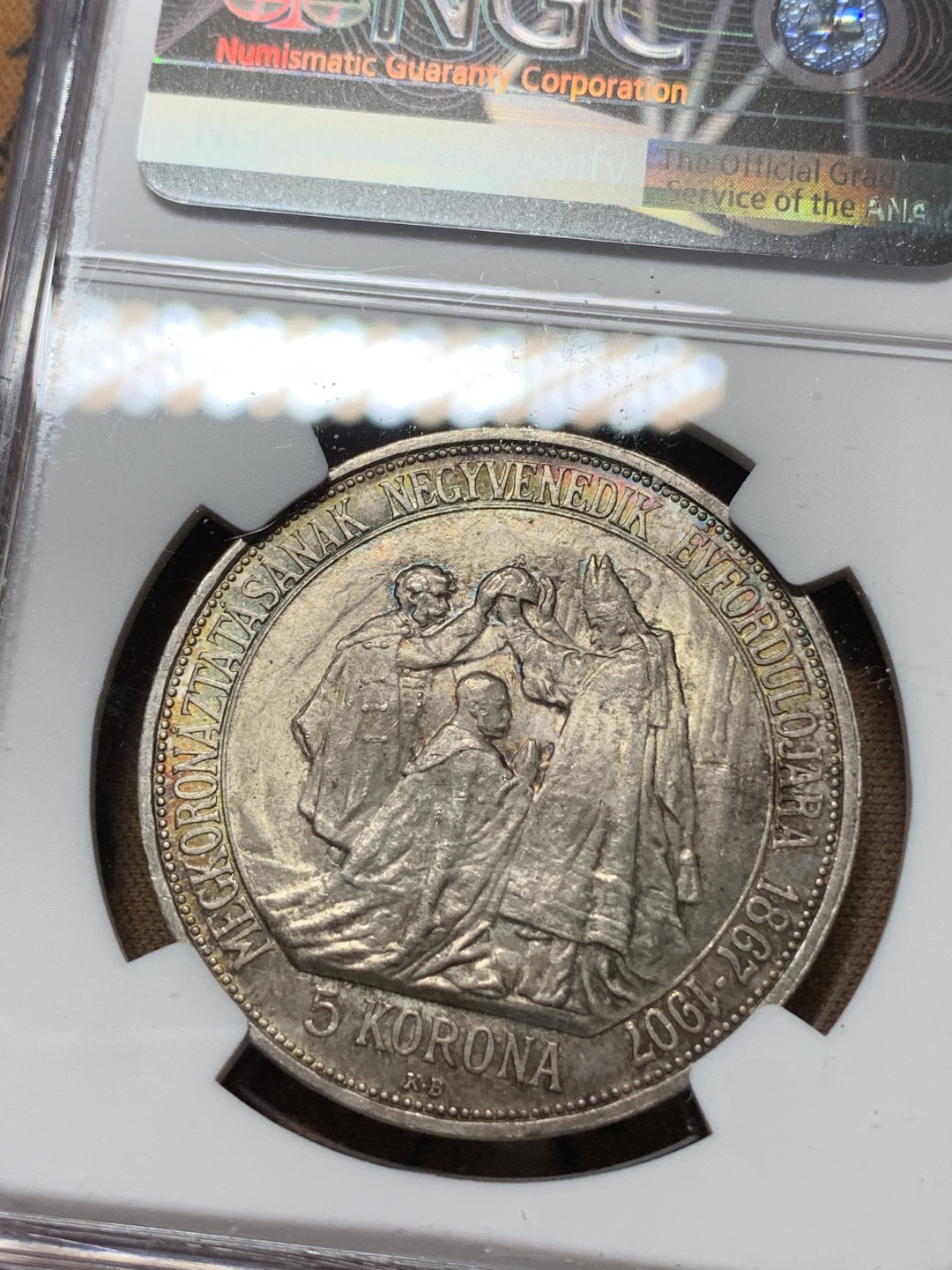 《竞宝斋》钱币微拍-第14场-本周日，周一2场连拍（全场顺丰包邮） NGC-MS64 原铸！匈牙利 1907年 加冕5克朗 银币 转光带彩包浆 一流的味道