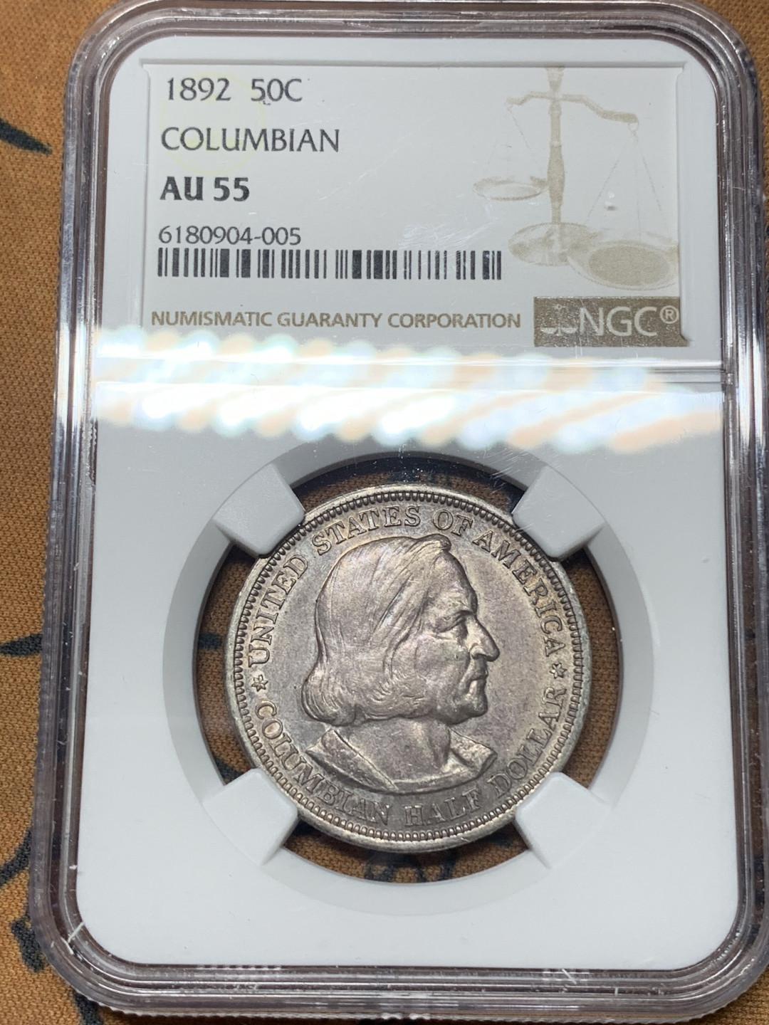 《竞宝斋》钱币微拍-第14场-本周日，周一2场连拍（全场顺丰包邮） NGC-AU55 美国 1892年 哥伦布半圆 银币 传世老包浆