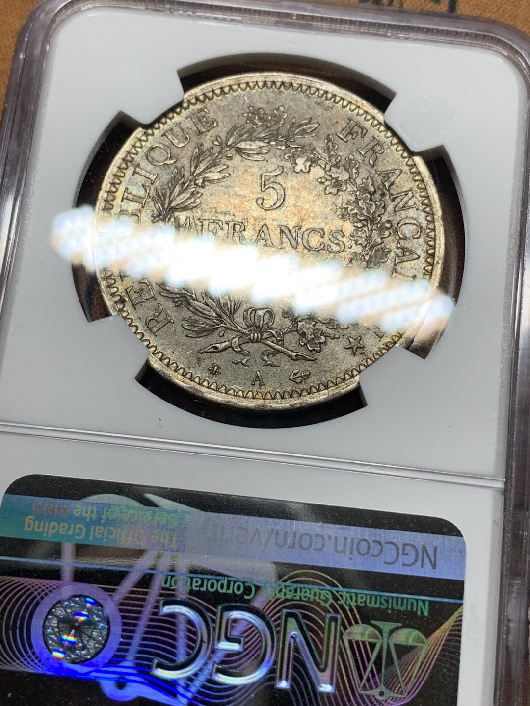 《竞宝斋》钱币微拍-第14场-本周日，周一2场连拍（全场顺丰包邮） NGC-AU58 法国 1873年 大力神 5法郎 银币 原味带彩好品