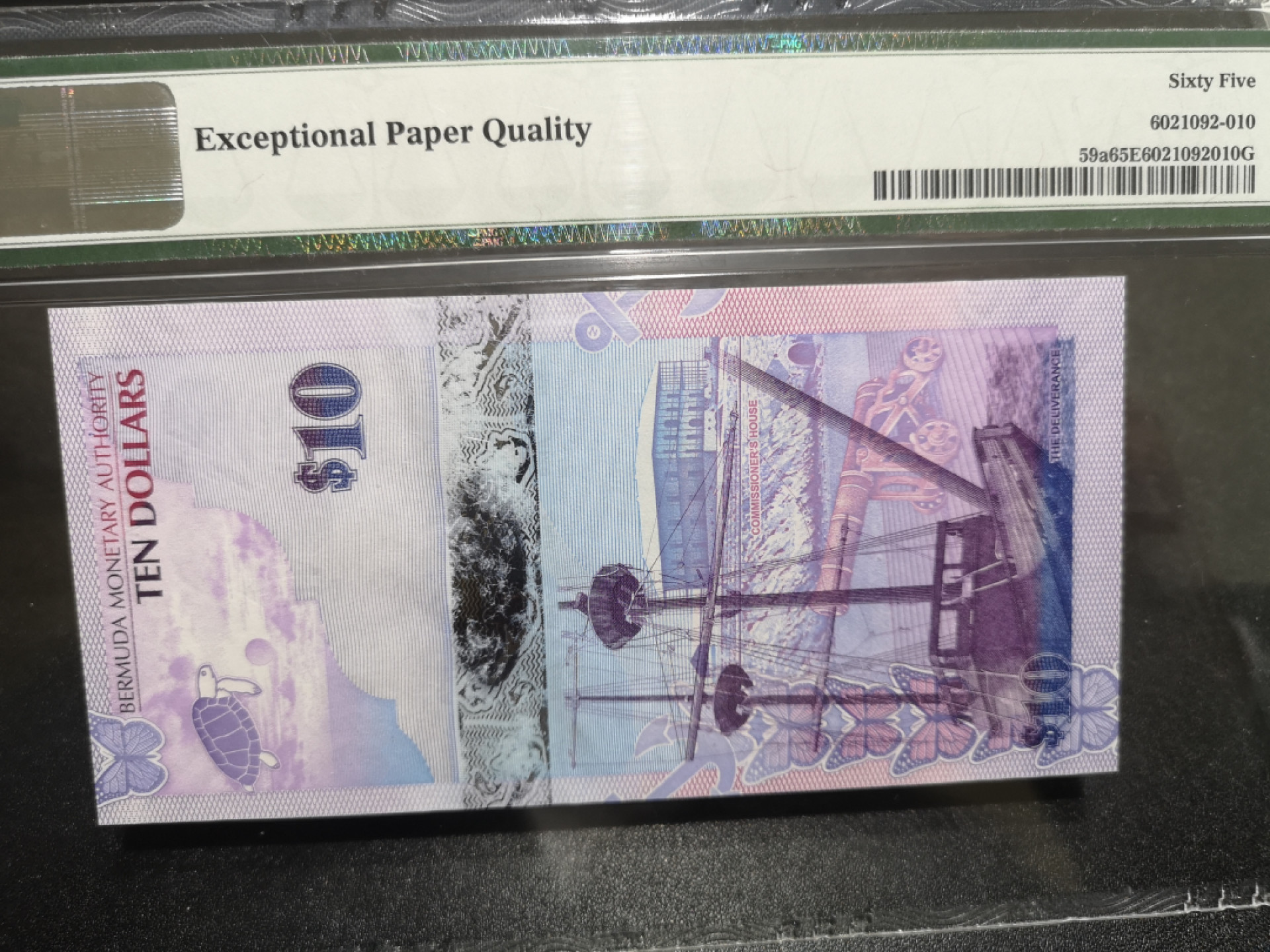 《外钞收藏家》第一百四十七期拍卖连拍第一场（98件） 2009年百慕大10刀 PMG65 洋葱冠