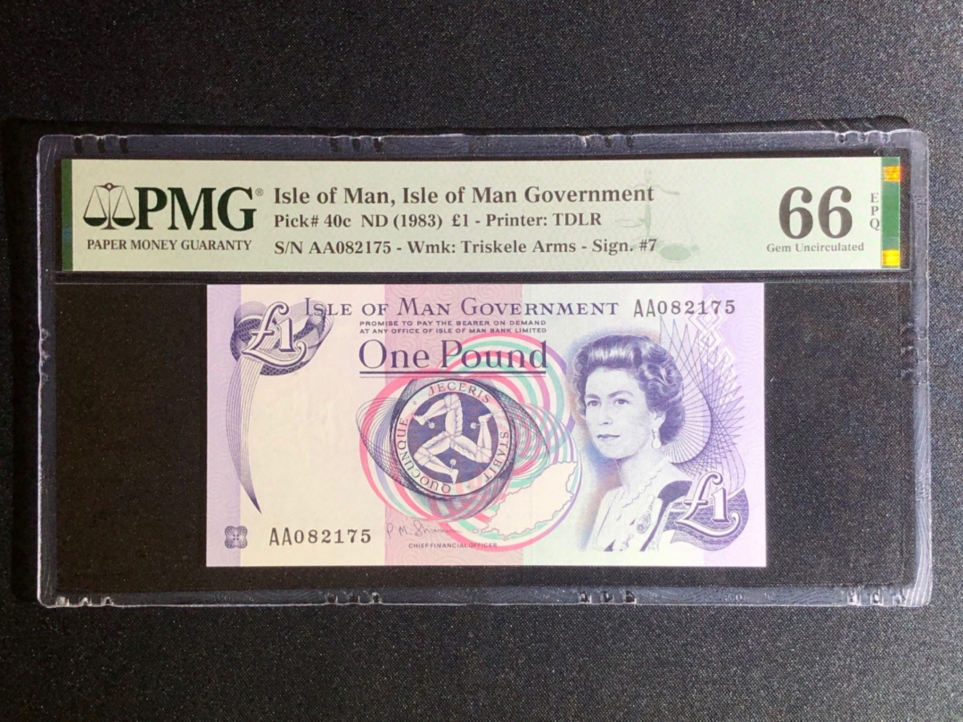 《张总收藏》42期—全新好钞 马恩岛1镑 PMG66E AA冠女王 1983年