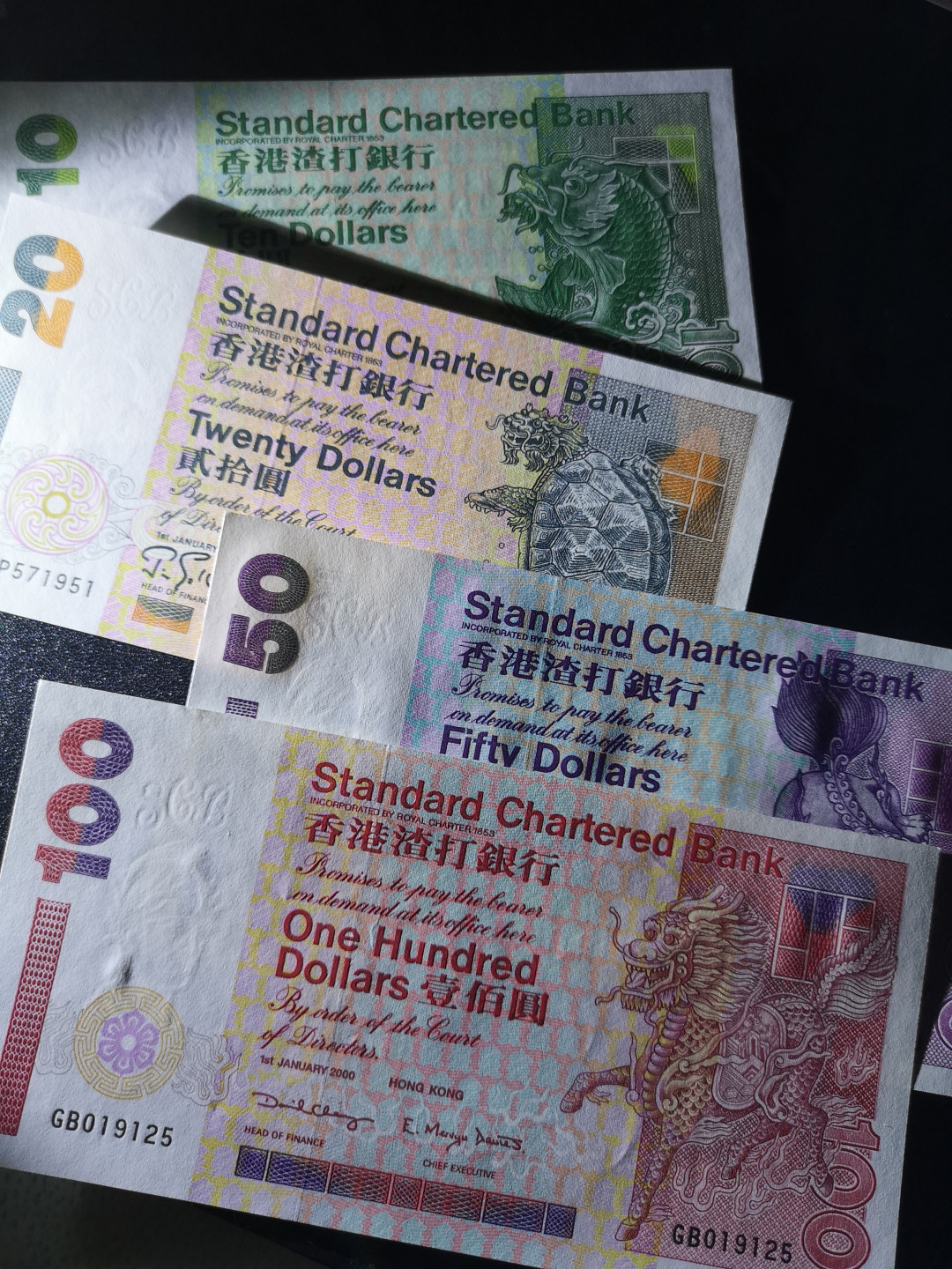 《外钞收藏家》第一百四十七期拍卖连拍第一场（98件） 2000年香港渣打银行四张 小套 全新UNC