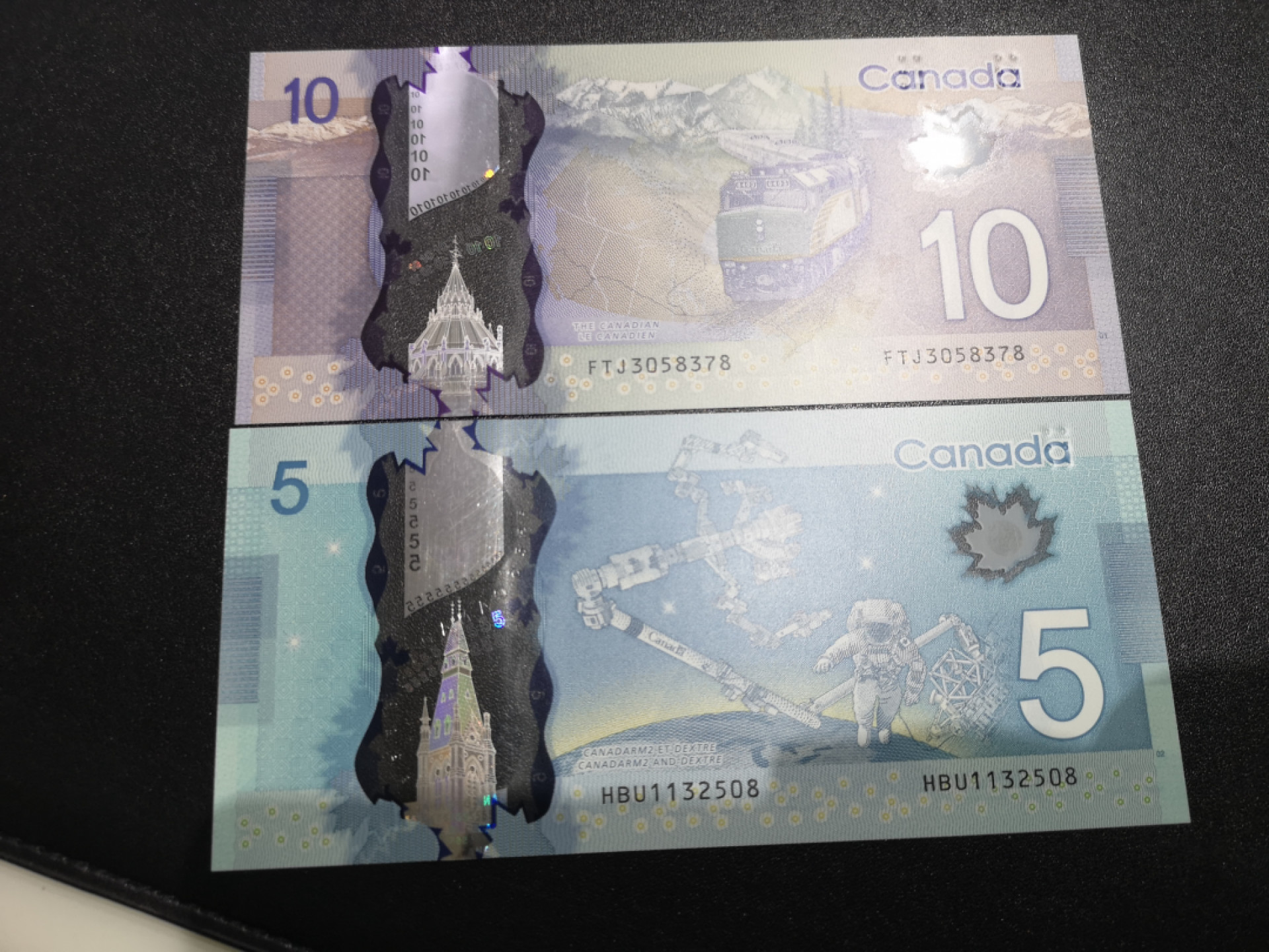 《外钞收藏家》第一百四十七期拍卖连拍第一场（98件） 加拿大最新版塑料钞 5、10加元 两张 全新UNC