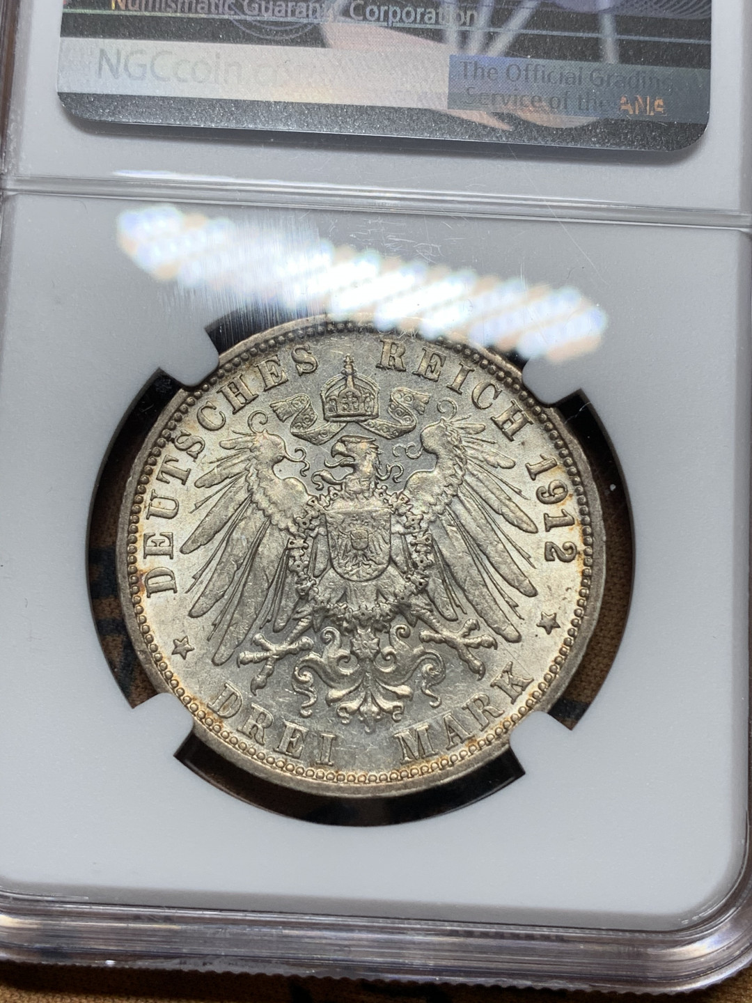 《竞宝斋》钱币微拍-第15场-本周日，周一2场连拍（全场顺丰包邮） NGC MS61 五彩 德国 符腾堡 1912年 3马克 银币 正面彩色包浆  背面光线漂亮