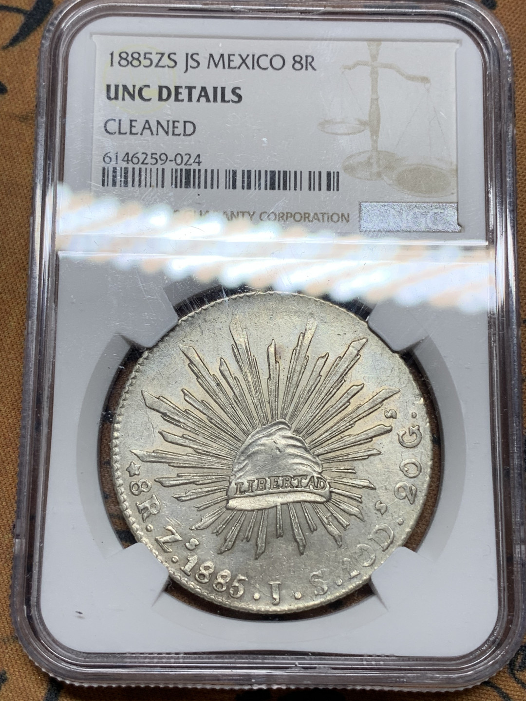《竞宝斋》钱币微拍-第15场-本周日，周一2场连拍（全场顺丰包邮） NGC-UNCD  墨西哥 1885年 8 里亚尔  萨斯特卡斯厂  银币     原味粉光 