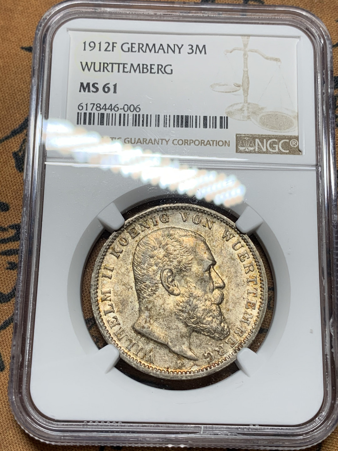 《竞宝斋》钱币微拍-第15场-本周日，周一2场连拍（全场顺丰包邮） NGC MS61 五彩 德国 符腾堡 1912年 3马克 银币 正面彩色包浆  背面光线漂亮