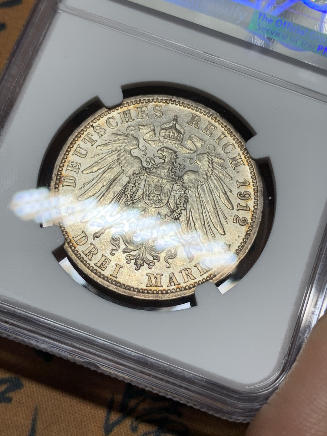 《竞宝斋》钱币微拍-第15场-本周日，周一2场连拍（全场顺丰包邮） NGC MS61 五彩 德国 符腾堡 1912年 3马克 银币 正面彩色包浆  背面光线漂亮