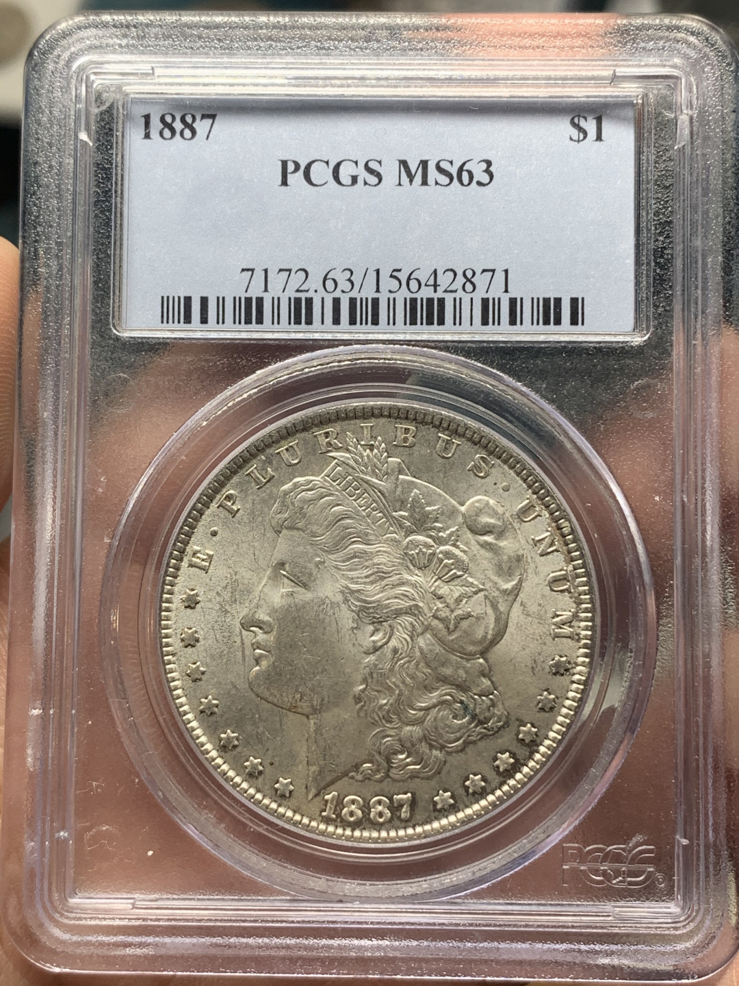 《竞宝斋》钱币微拍-第15场-本周日，周一2场连拍（全场顺丰包邮） PCGS MS63 美国1887摩根银币 淡彩老白盒