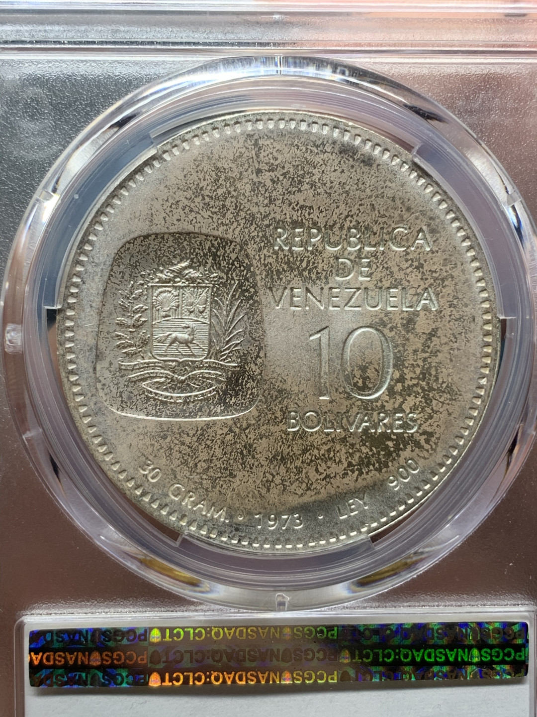 《竞宝斋》钱币微拍-第15场-本周日，周一2场连拍（全场顺丰包邮） PCGS MS63委内瑞拉1973年10玻利瓦尔独特设计西蒙玻利瓦尔100周年纪念