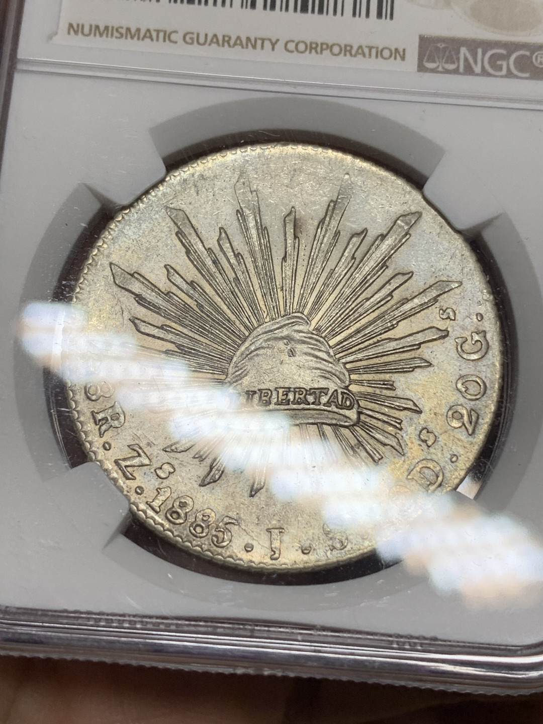 《竞宝斋》钱币微拍-第15场-本周日，周一2场连拍（全场顺丰包邮） NGC-UNCD  墨西哥 1885年 8 里亚尔  萨斯特卡斯厂  银币     原味粉光 