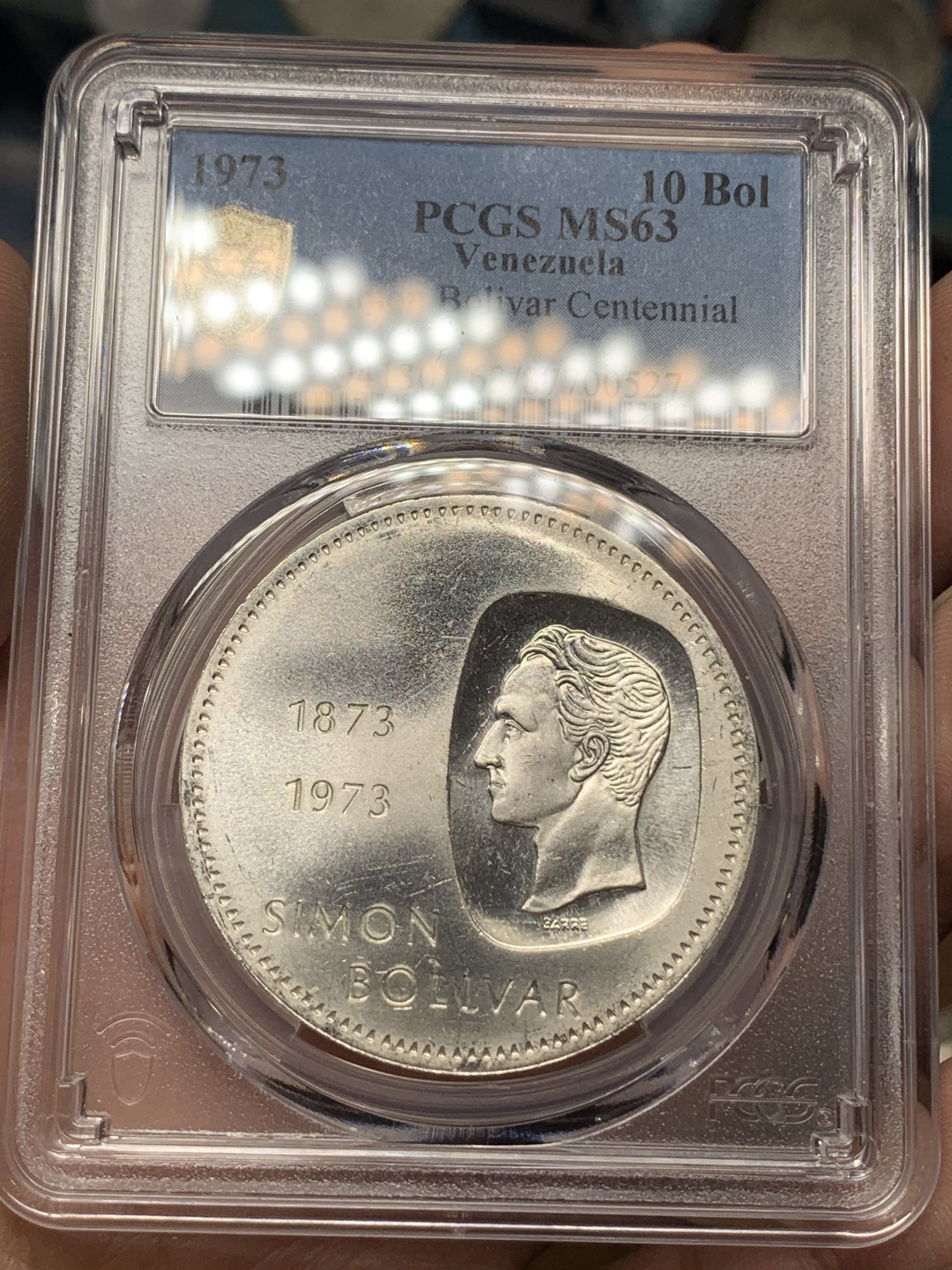 《竞宝斋》钱币微拍-第15场-本周日，周一2场连拍（全场顺丰包邮） PCGS MS63委内瑞拉1973年10玻利瓦尔独特设计西蒙玻利瓦尔100周年纪念