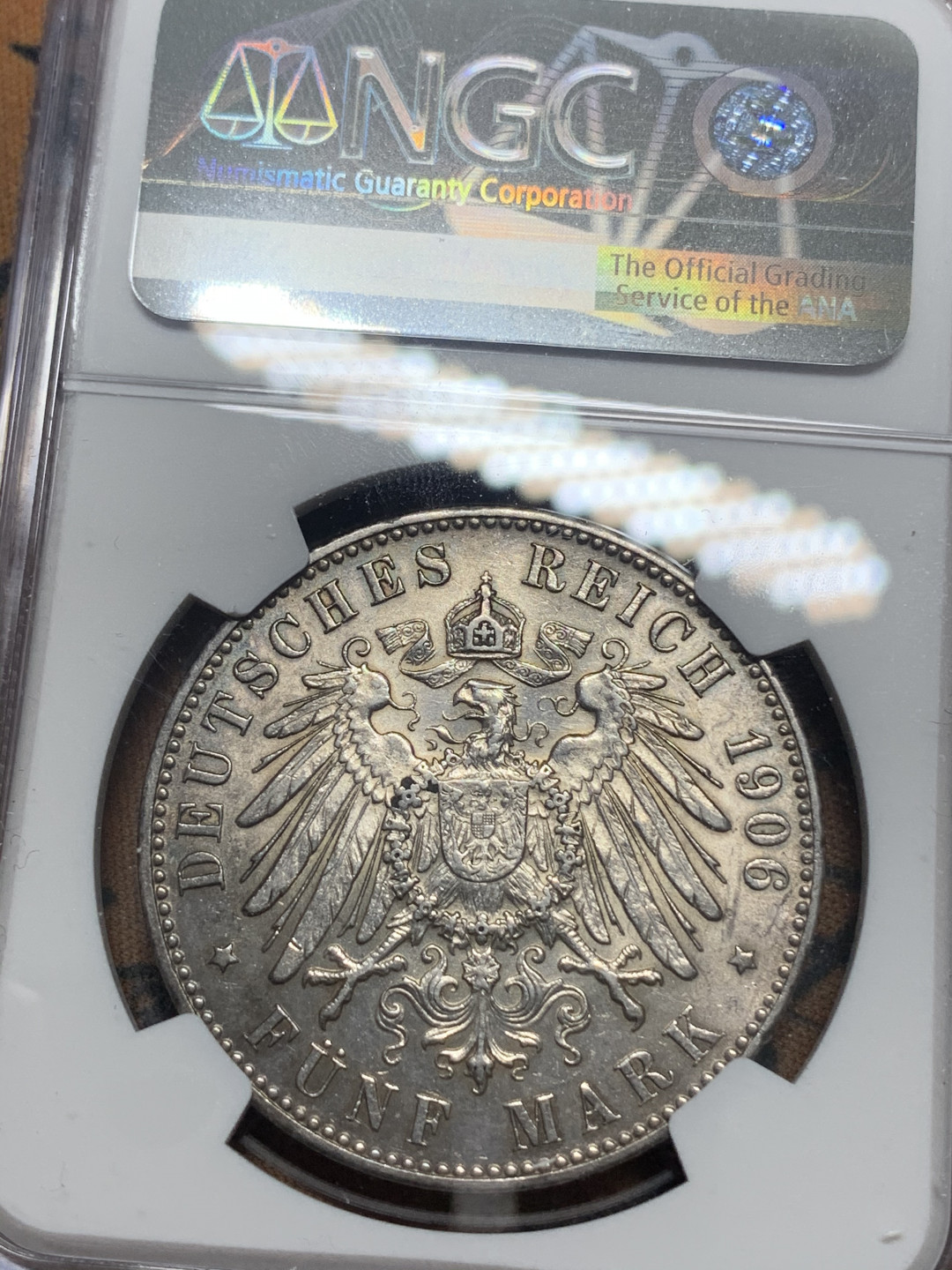 《竞宝斋》钱币微拍-第15场-本周日，周一2场连拍（全场顺丰包邮） NGC-MS63  德国不莱梅 1906-J年 双狮盾徽 5马克 银币 转光带彩 一流的品相味道