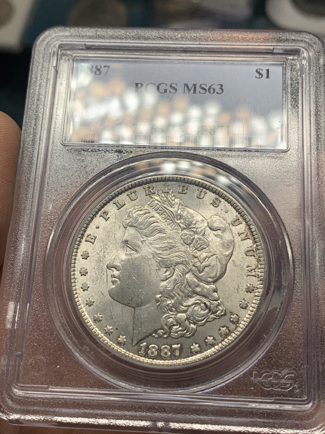 《竞宝斋》钱币微拍-第15场-本周日，周一2场连拍（全场顺丰包邮） PCGS MS63 美国1887摩根银币 淡彩老白盒