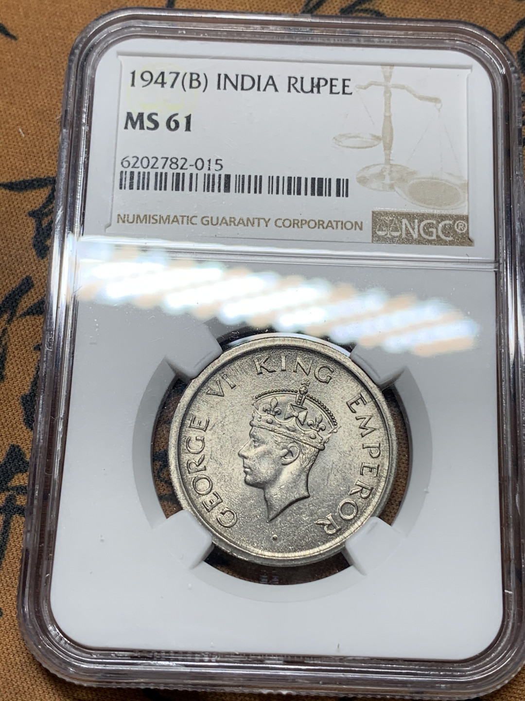 《竞宝斋》钱币微拍-第15场-本周日，周一2场连拍（全场顺丰包邮） NGC MS61印度1947年1卢比亚洲豹印度独立前最后一版，材质问题极少出高分