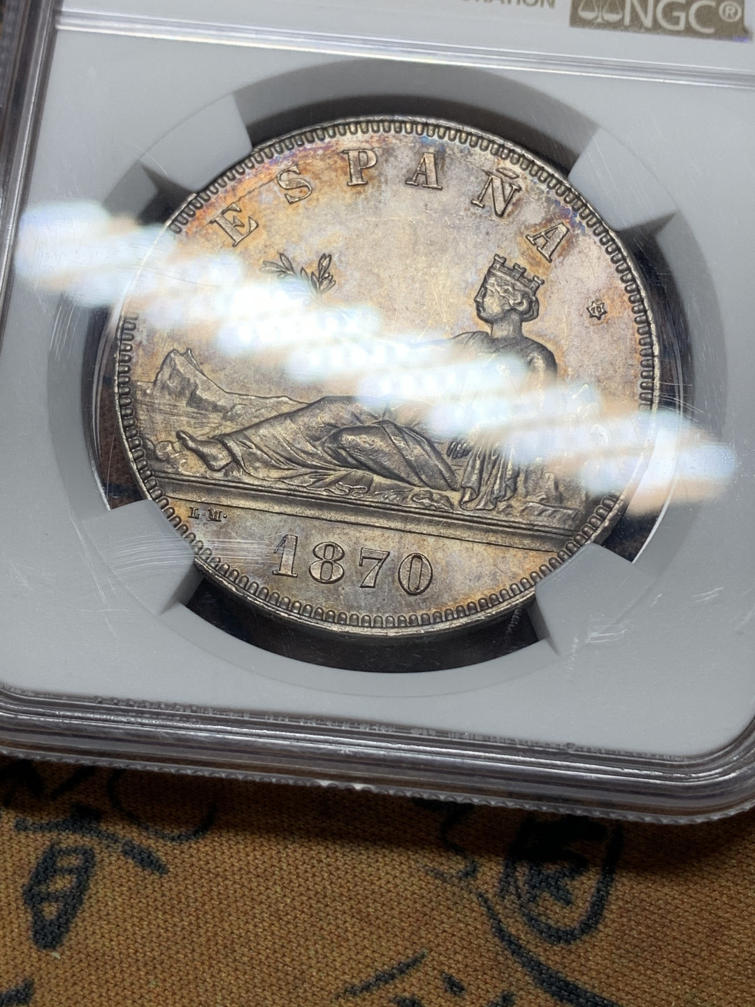 《竞宝斋》钱币微拍-第15场-本周日，周一2场连拍（全场顺丰包邮） NGC-MS61 西班牙 1870年坐花双柱 5比塞塔银币 上海低评 可以对比脸部细节和背面盾徽 完全不输给63的级别