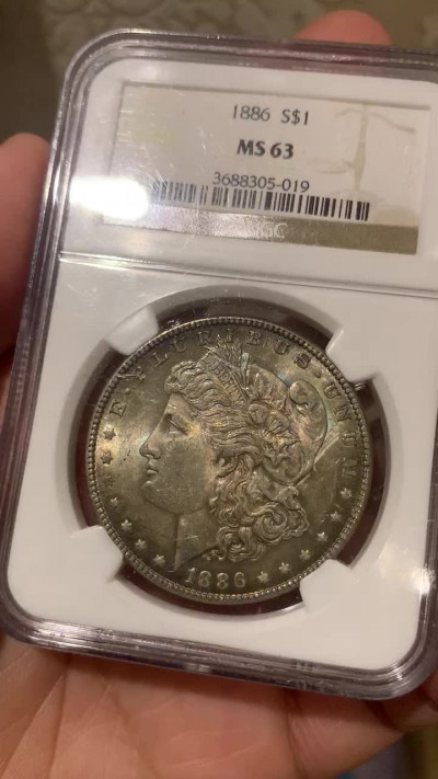 《竞宝斋》钱币微拍-第16场-本周日，周一2场连拍（全场顺丰包邮） NGC-MS63 美国 1886年 1Dollar 摩根银币 双面深五彩难得 非常耐看