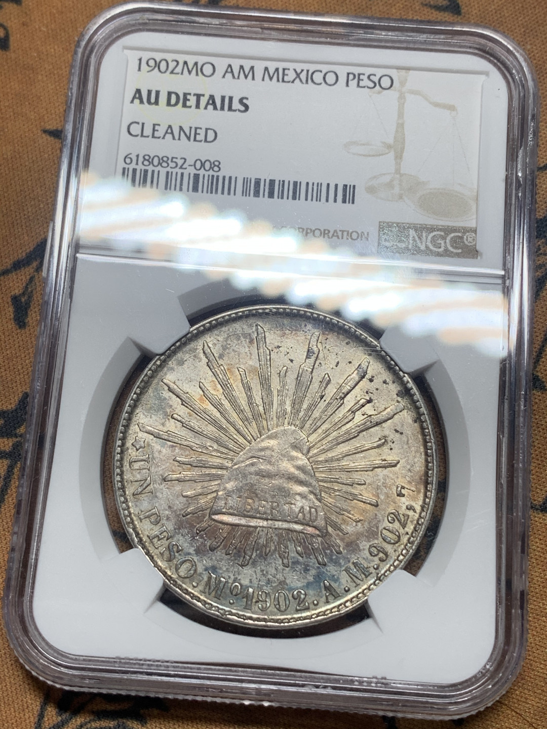 《竞宝斋》钱币微拍-第16场-本周日，周一2场连拍（全场顺丰包邮） NGC-AUD 墨西哥 1902年 MO 1比索 鹰洋银币 好年份五彩包浆相当漂亮！