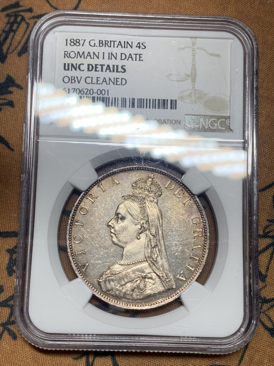 《竞宝斋》钱币微拍-第16场-本周日，周一2场连拍（全场顺丰包邮） NGC-UNC DETAILS 英国1887年2福林4先令 22.4克虽NGC评级标注略有清洗 表面镜面光泽接近PL