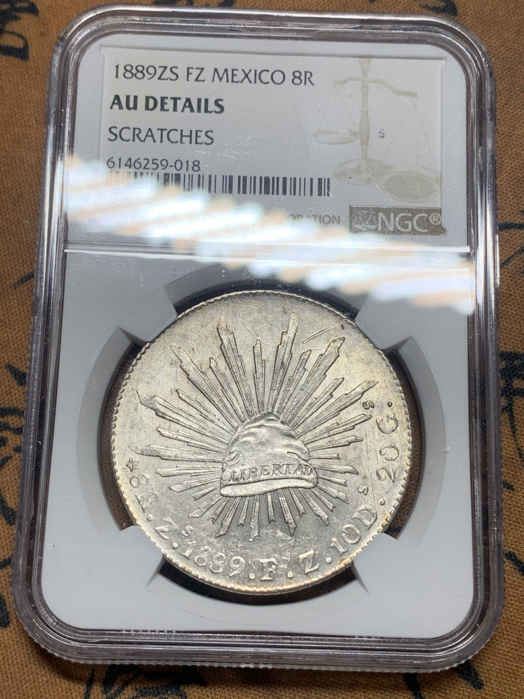 《竞宝斋》钱币微拍-第16场-本周日，周一2场连拍（全场顺丰包邮） NGC-AUD  墨西哥 1889年 8 里亚尔 萨斯特卡斯厂 银币 原味粉光 鹰洋