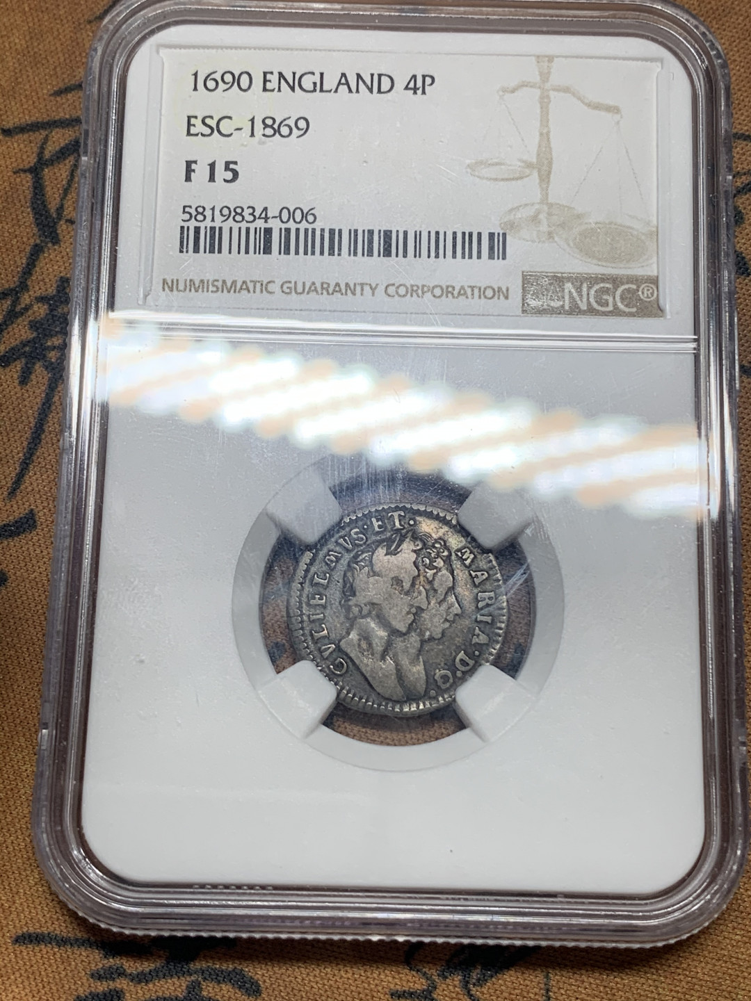 《竞宝斋》钱币微拍-第16场-本周日，周一2场连拍（全场顺丰包邮） 英国 1690年 威廉与玛丽 1690年 4便士银币 洗脚币 难得品种