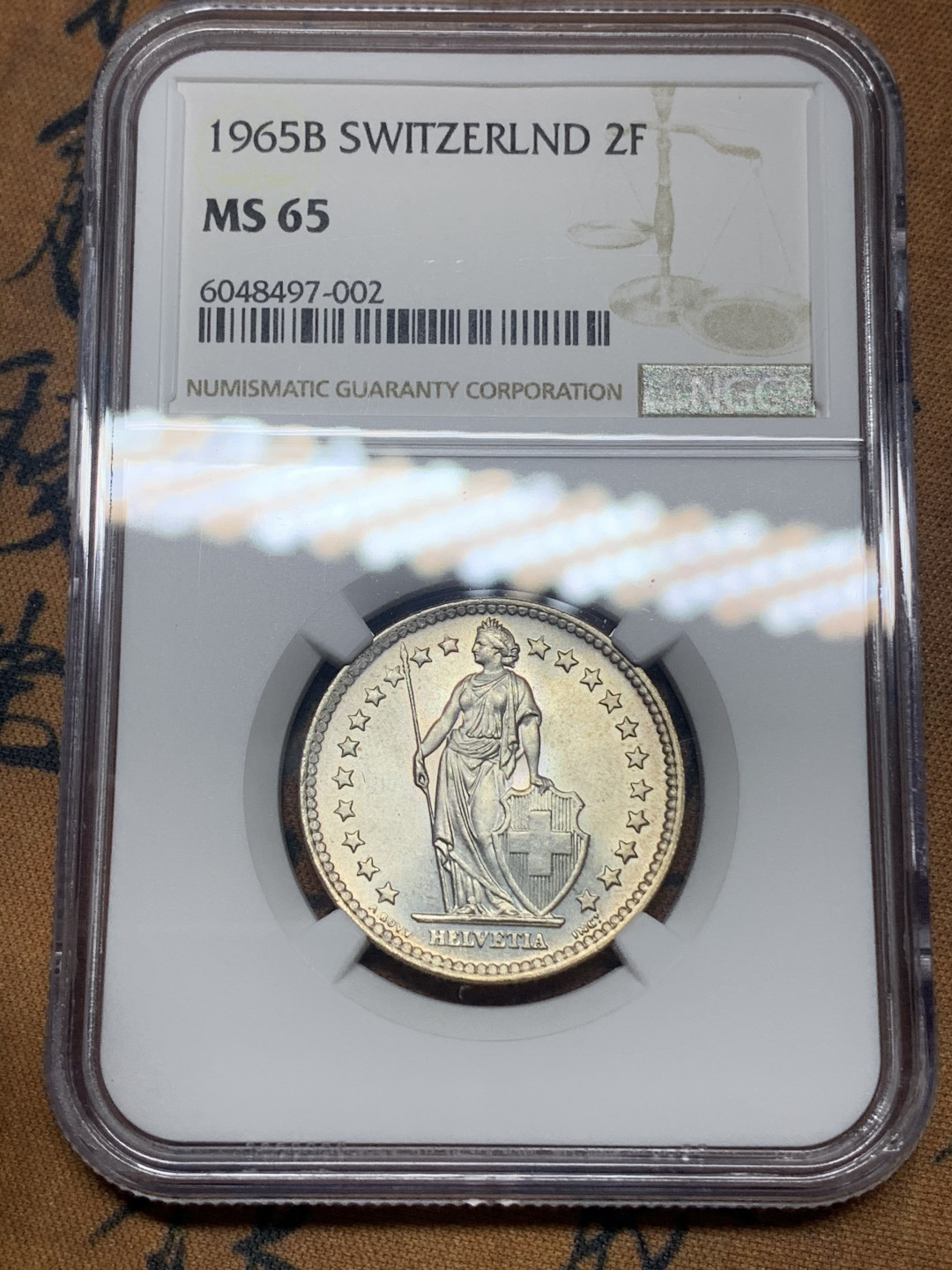 《竞宝斋》钱币微拍-第16场-本周日，周一2场连拍（全场顺丰包邮） ngc-ms65 瑞士 1965年 2法郎银币 赫尔维蒂女神 车轮转光