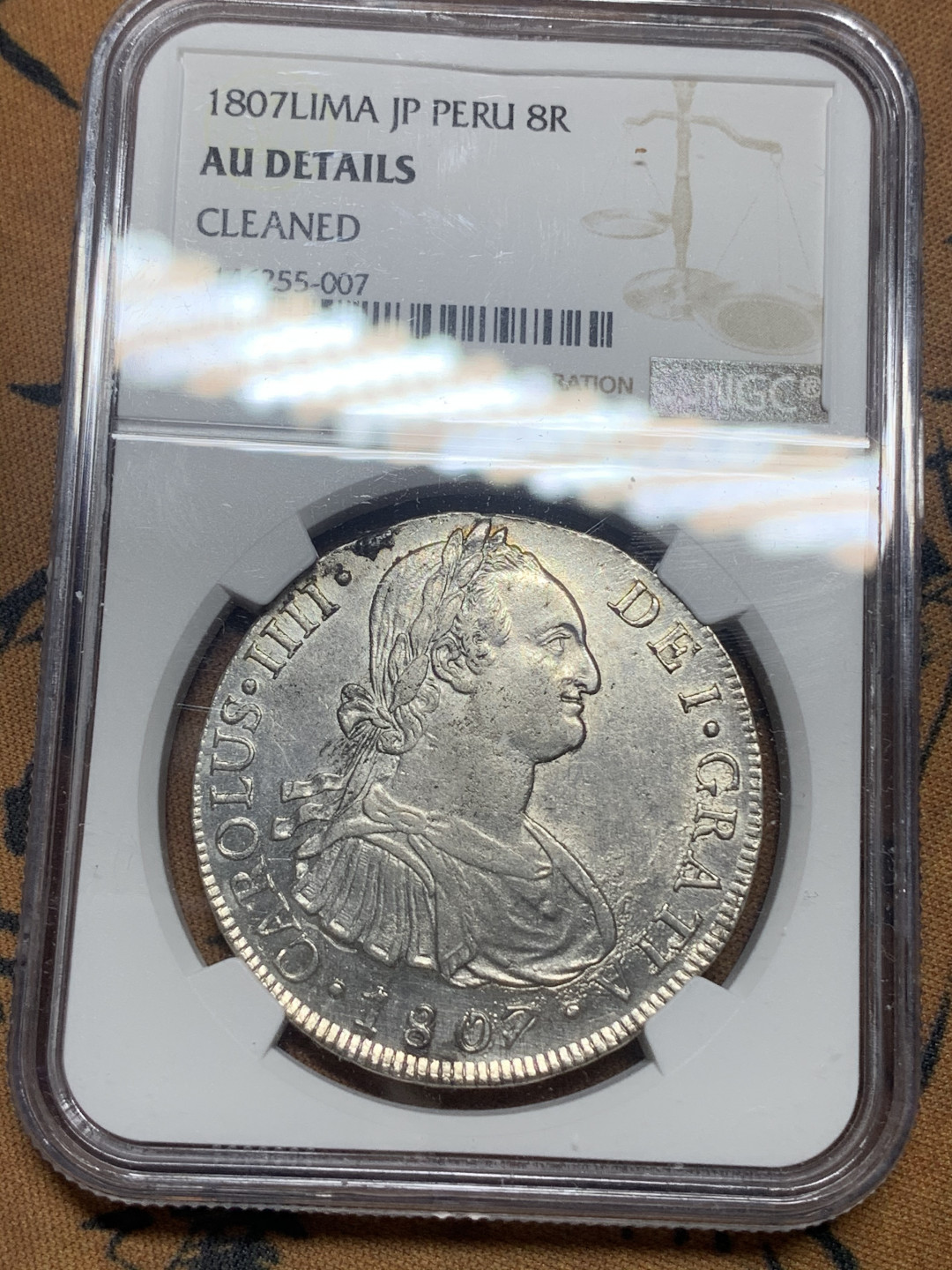 《竞宝斋》钱币微拍-第16场-本周日，周一2场连拍（全场顺丰包邮） NGC-AUD 秘鲁 1807年 8 里亚尔  人像双柱卡洛斯四世  银币      原味