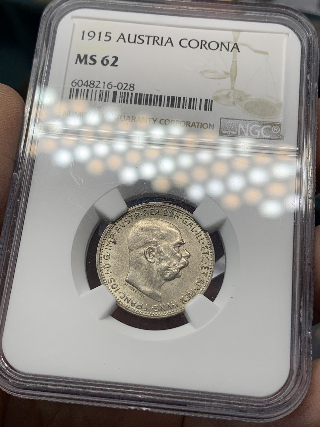 《竞宝斋》钱币微拍-第17场-本周日，周一2场连拍（全场顺丰包邮） NGC-MS62 奥匈帝国 1915年 1克朗 银币 双面转光明显 精品辅币