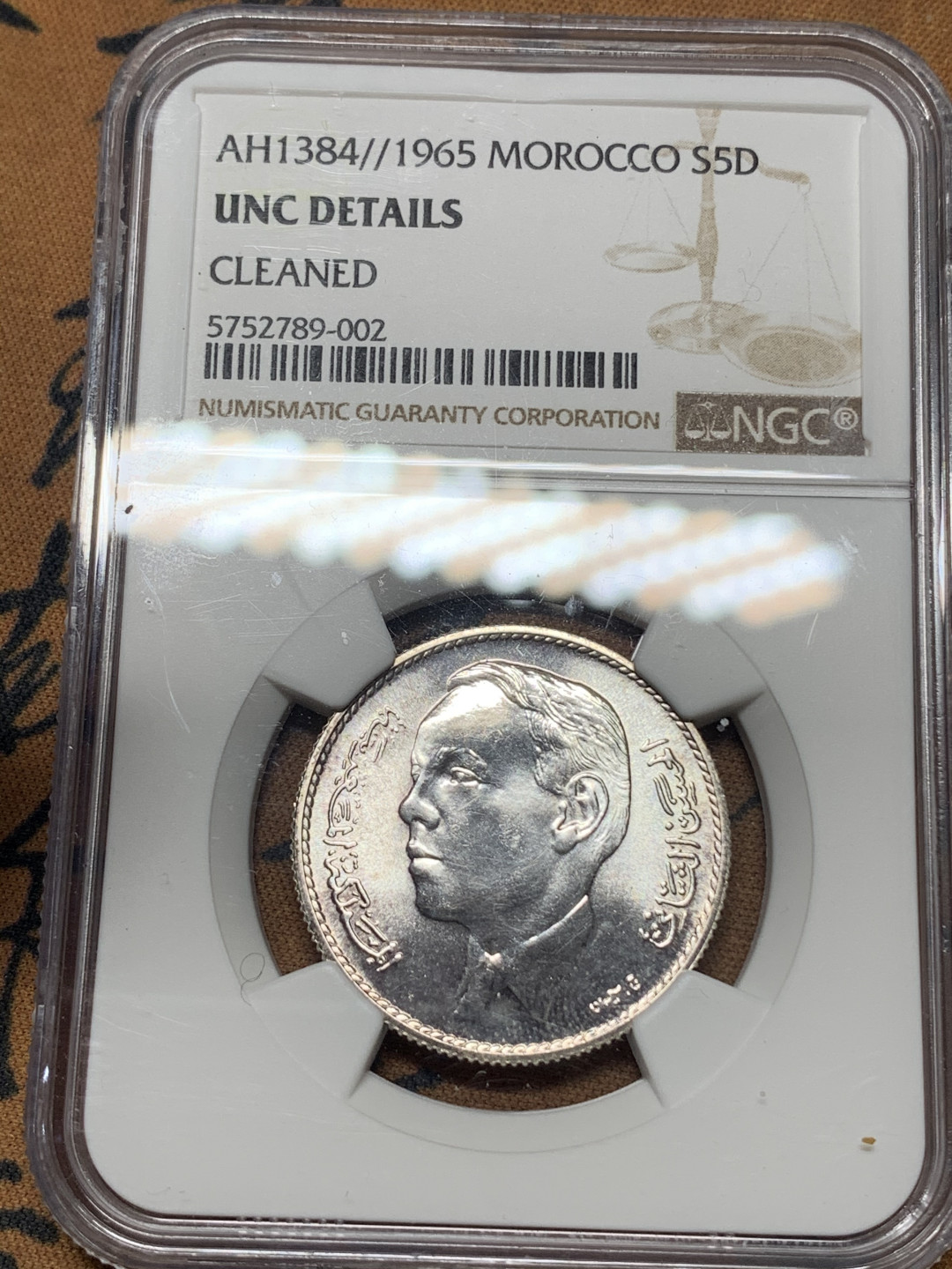 《竞宝斋》钱币微拍-第17场-本周日，周一2场连拍（全场顺丰包邮） NGC-UNC 摩洛哥 1965年 5迪拉姆 银币 一流的状态居然没给分