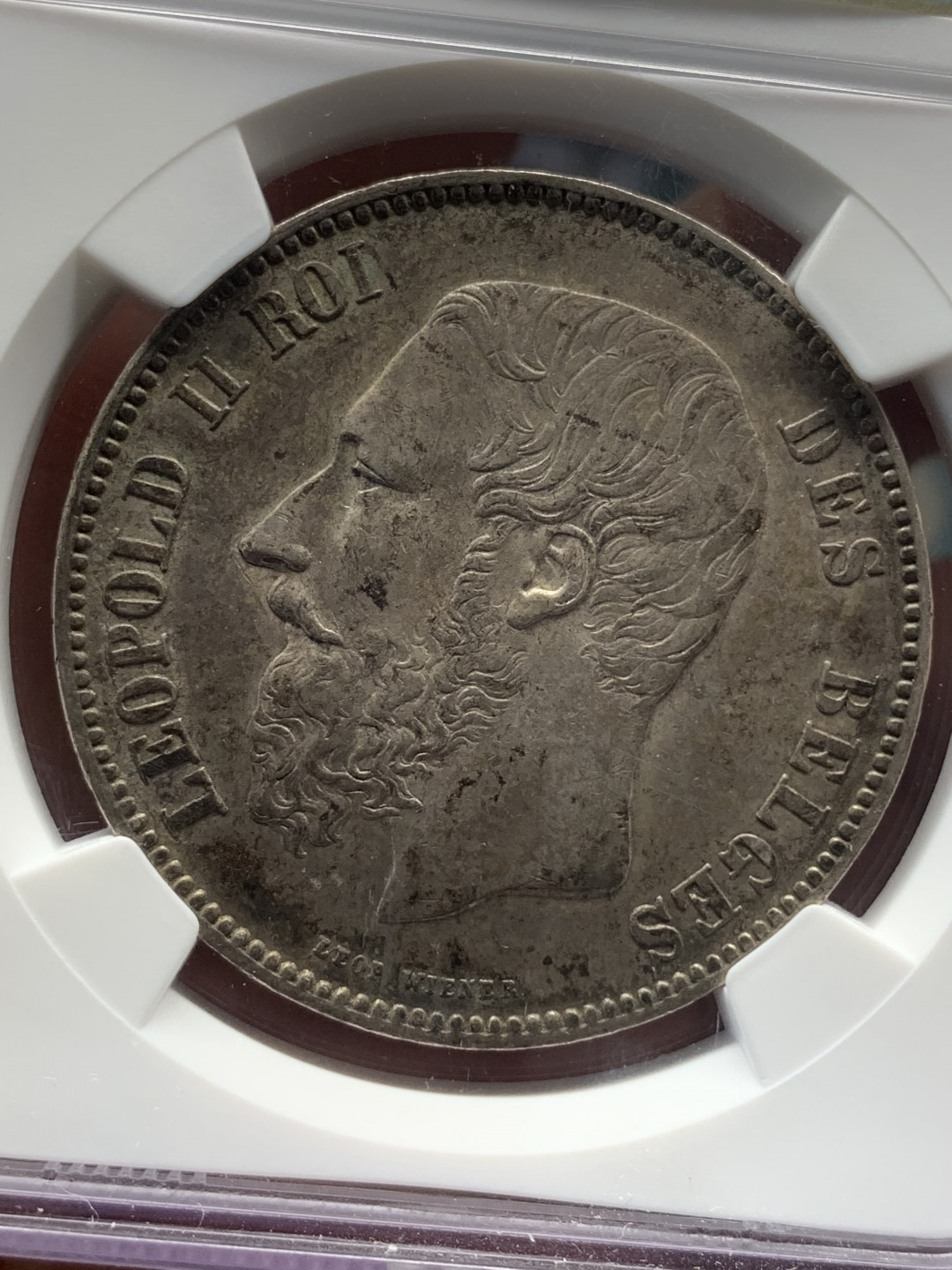 《竞宝斋》钱币微拍-第17场-本周日，周一2场连拍（全场顺丰包邮） NGC-MS62 比利时 1873年 5法郎 利奥波德二世 银币 极致老包浆 背面精美 比利时潜力主币品种