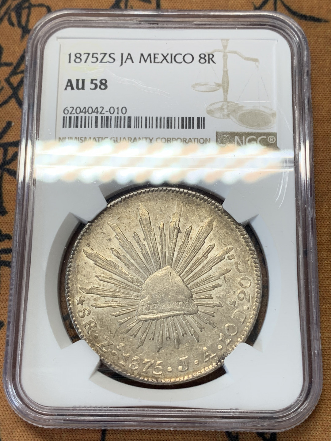《竞宝斋》钱币微拍-第17场-本周日，周一2场连拍（全场顺丰包邮） NGC-AU58 墨西哥1875年8R  黄油光中期鹰洋