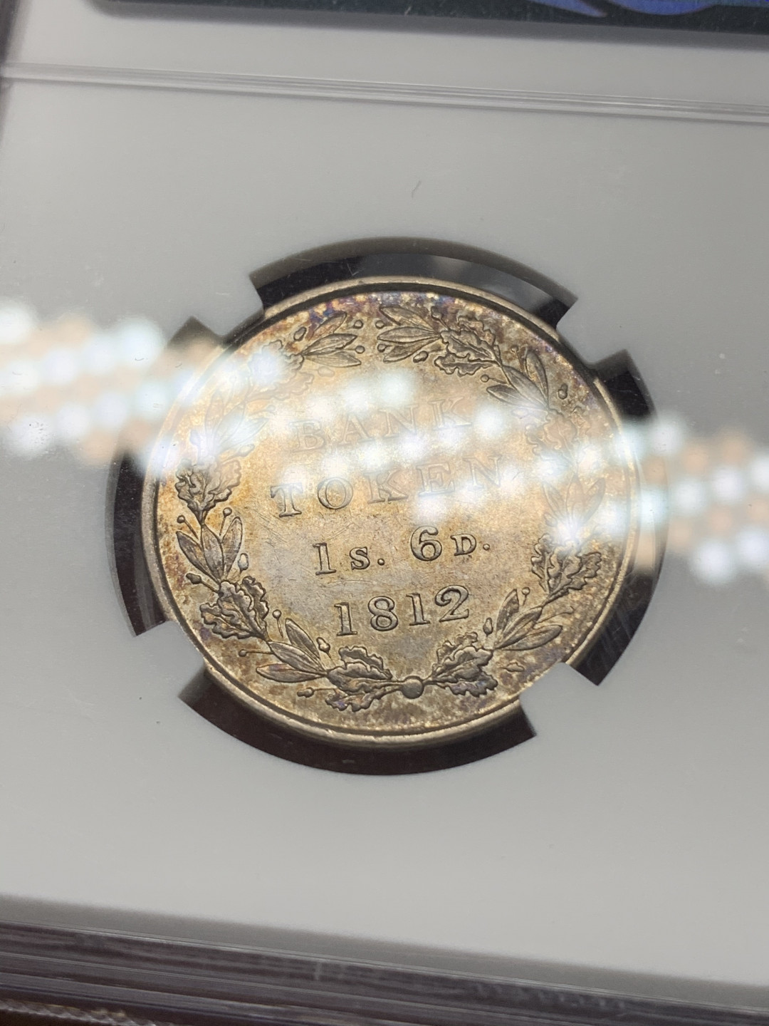 《竞宝斋》钱币微拍-第17场-本周日，周一2场连拍（全场顺丰包邮） NGC-AU 英国 英格兰 1812年 乔三 1先令6便士 银币 酱彩包浆 细节状态都很好 少见